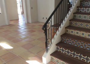 terracotta-tile-flooring-with-custom-tile-design-stairs