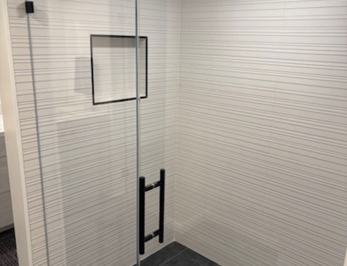 Modern Design Walk-in Shower Featuring White Texture Tile and Dark Tile Floor